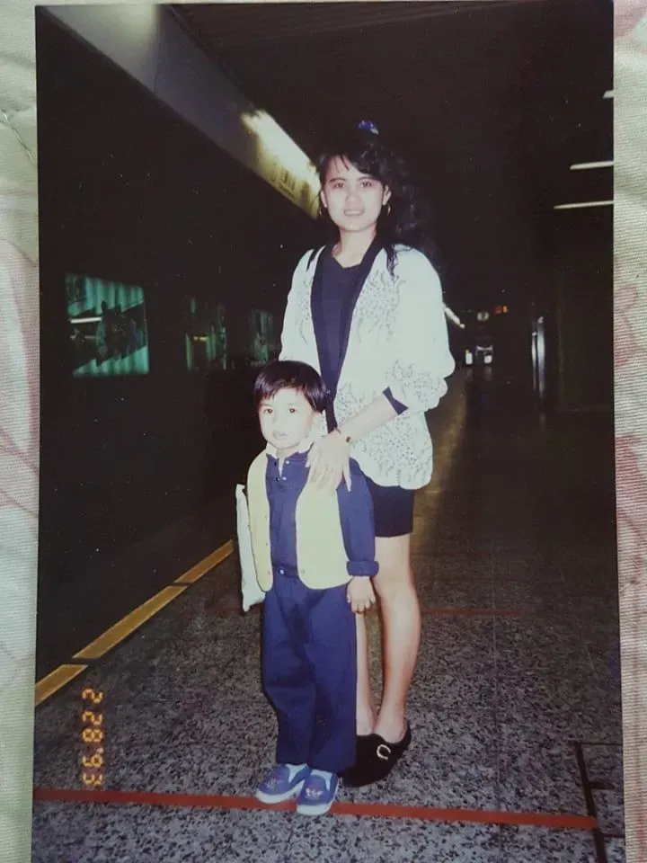 My nanny Jackie and I in the Hong Kong MTR, 1993.